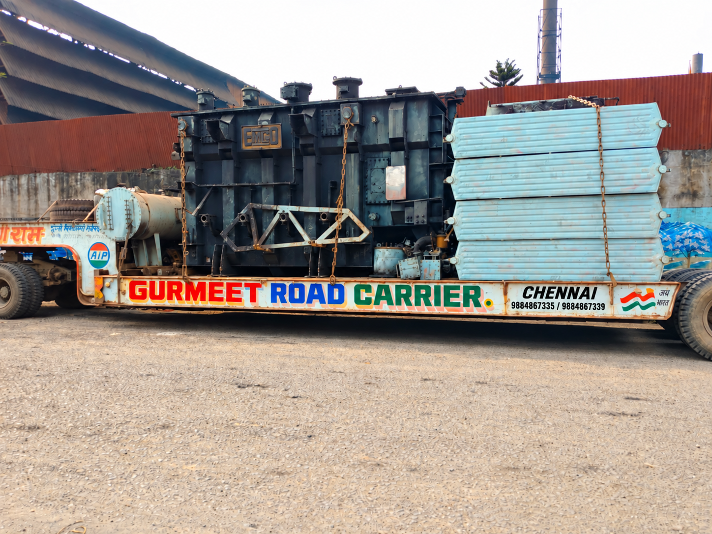 Power transformer loaded on a Road Carrier low-bed trailer